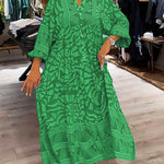 Green printed V-neck midi dress with 3/4 sleeves and button front