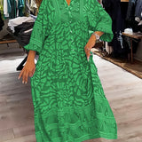 Green printed V-neck midi dress with 3/4 sleeves and button front