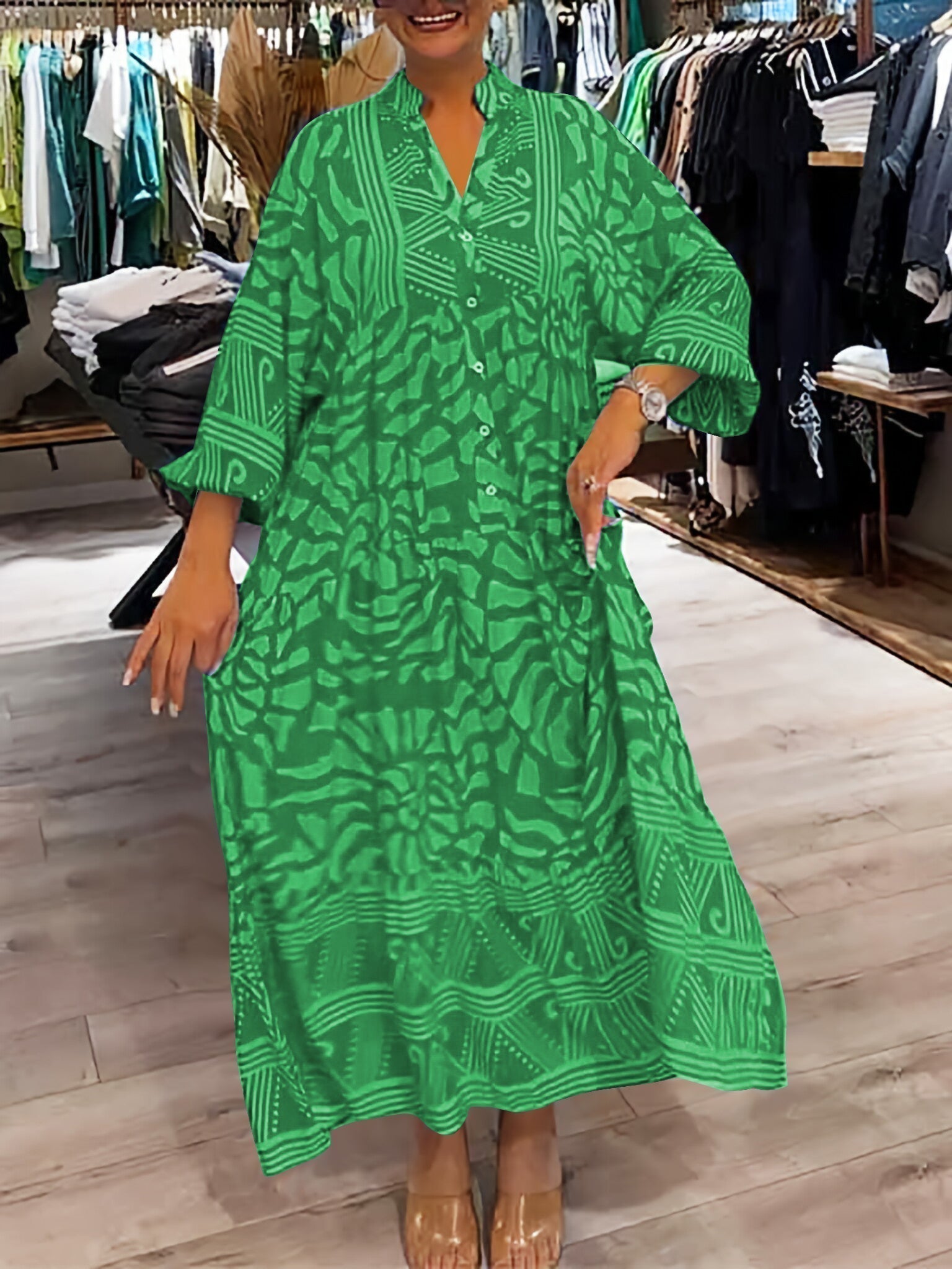 Green printed V-neck midi dress with 3/4 sleeves and button front