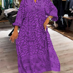Purple printed V-neck midi dress with 3/4 sleeves and button front