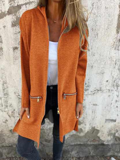 Rust orange hooded zip-front jacket with long sleeves and side zip pockets