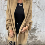 Beige long-sleeve wrap cardigan with fringe trim at cuffs and hem, open front