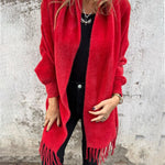 Red long-sleeve wrap cardigan with fringe trim, open front drape and collar
