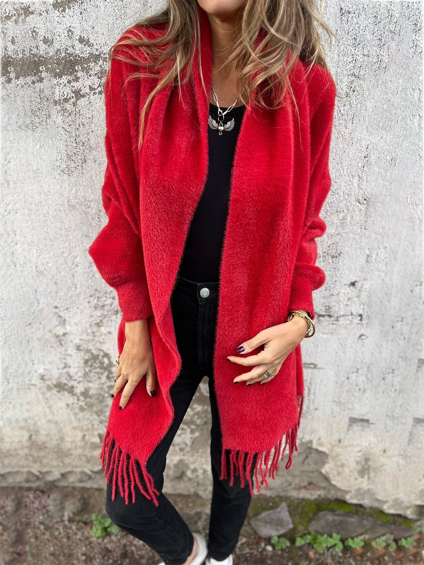 Red long-sleeve wrap cardigan with fringe trim, open front drape and collar
