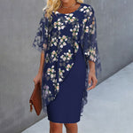Floral dress with sheer cape sleeves, dark blue base and white/pink blossoms