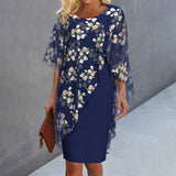 Floral dress with sheer cape sleeves, dark blue base and white/pink blossoms