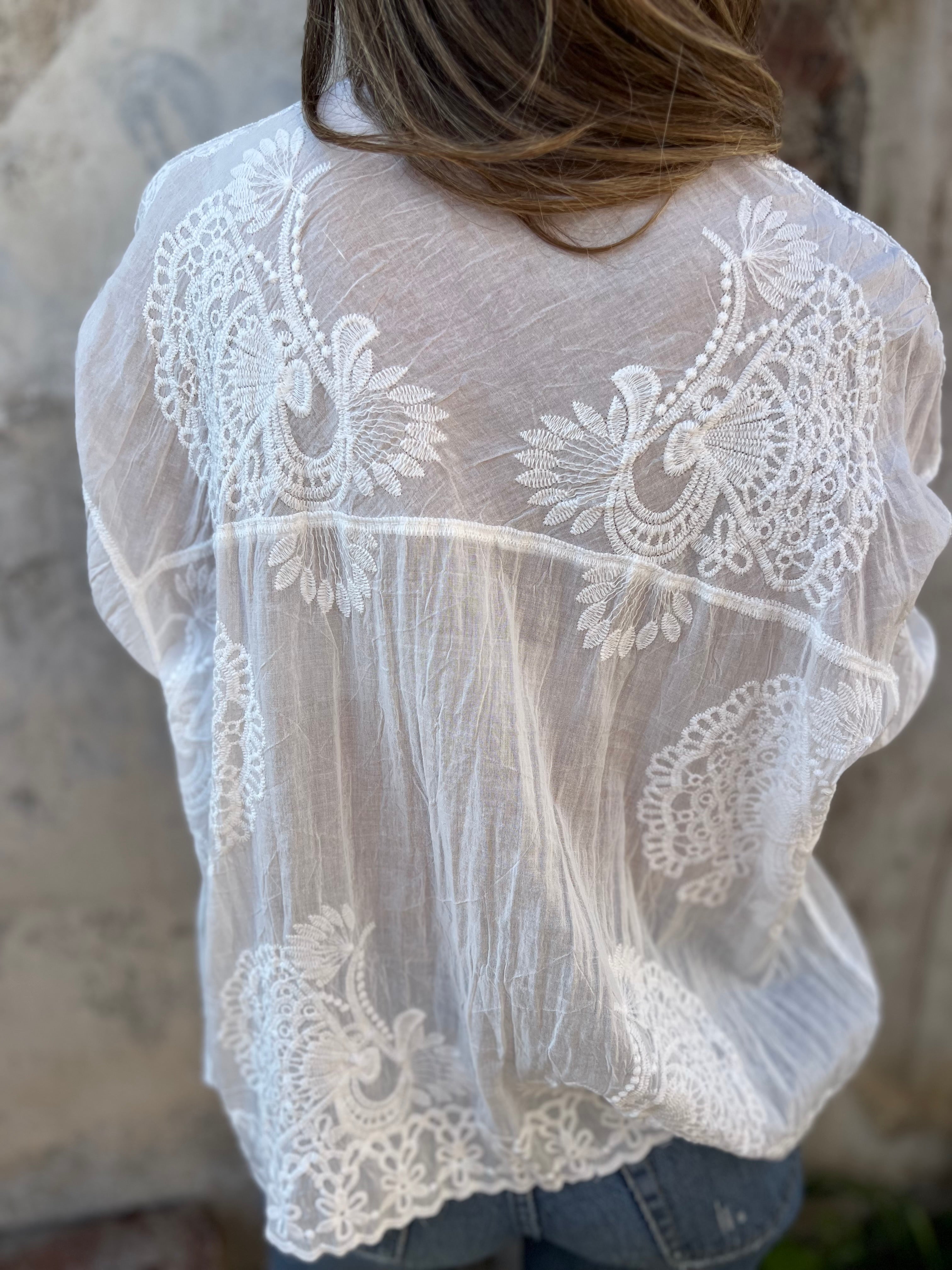White embroidered long-sleeve cardigan with floral lace back yoke and center seam
