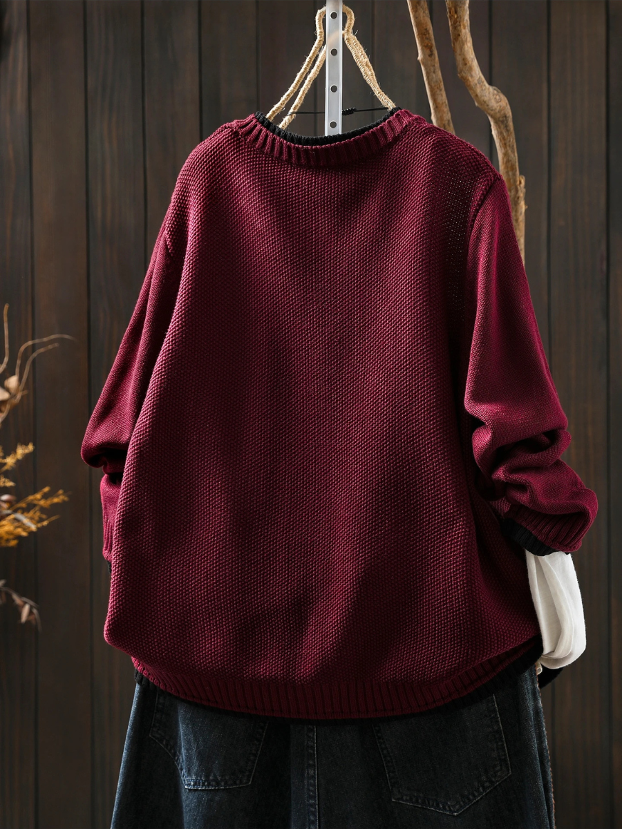 Burgundy knit structured cardigan with crew neckline and button placket