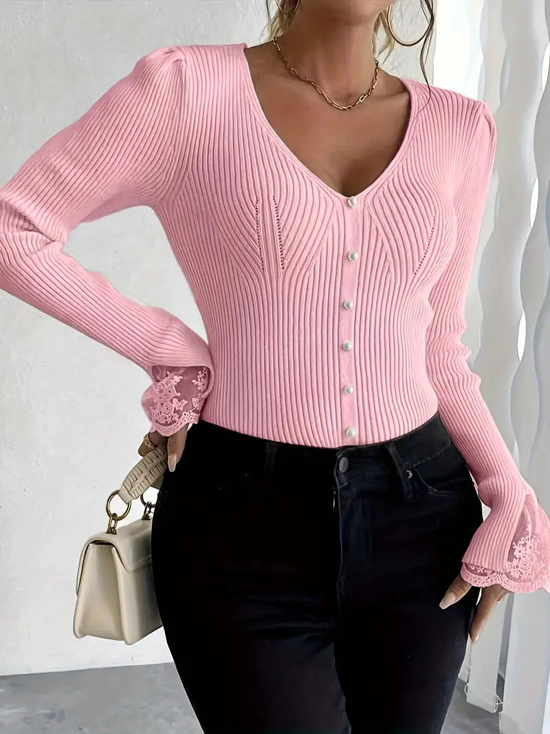 Pink ribbed V-neck button top with lace-trim cuffs and fitted long sleeves