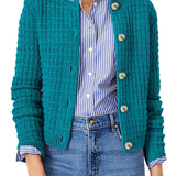 Teal knit cardigan with button front and ribbed cuffs, worn over a striped shirt