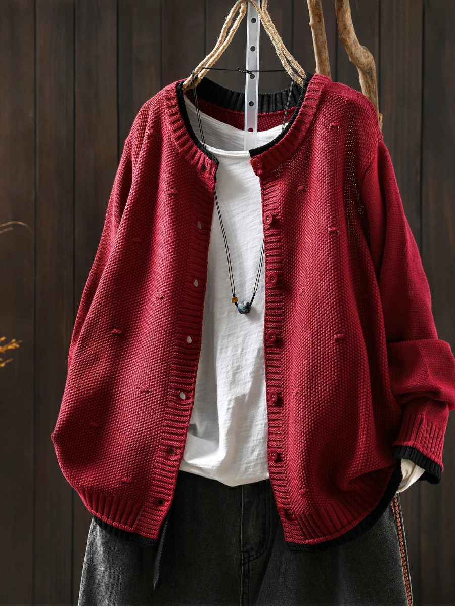 Burgundy textured knit cardigan with ribbed neckline, button front, and long sleeves