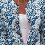 Blue and white floral V-neck cardigan with wooden-look button placket