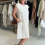 White zebra-print summer dress, round neckline and short sleeves, knee length