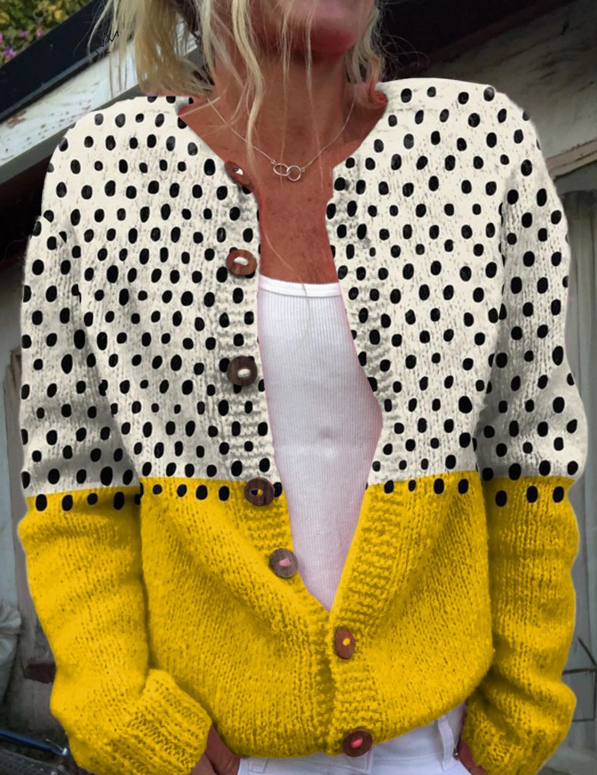 Polka-dot button-front cardigan sweater with yellow cuffs and hem
