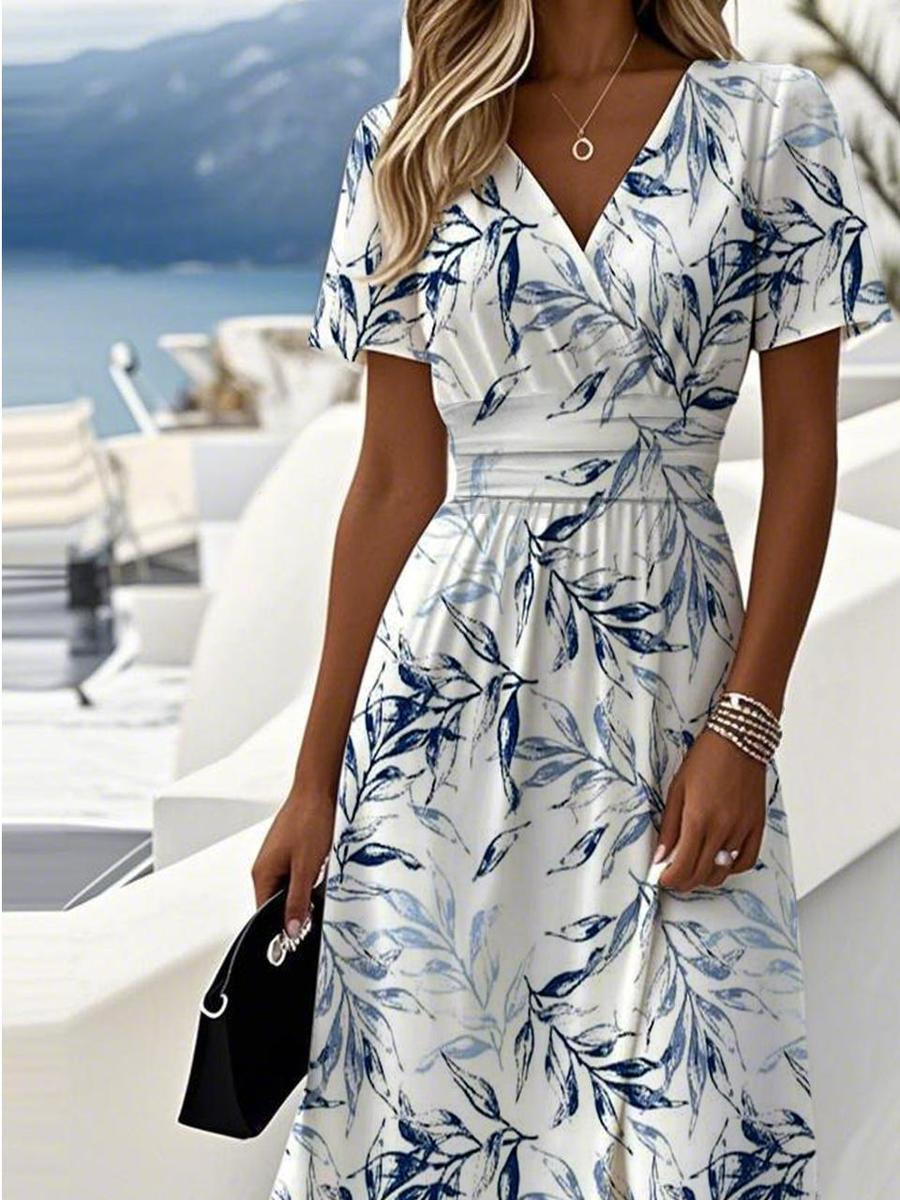 White midi dress with blue botanical print, V-neck, short sleeves, tied waist