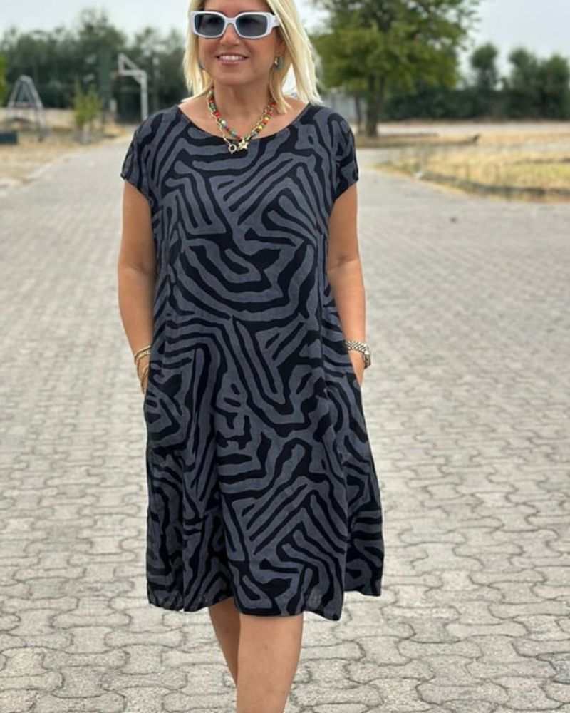 Black zebra-pattern summer dress, round neckline, short sleeves, knee length