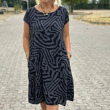 Black zebra-pattern summer dress, round neckline, short sleeves, knee length