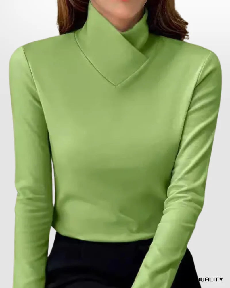 Women’s green roll-neck long-sleeve sweater with a V-shaped collar seam