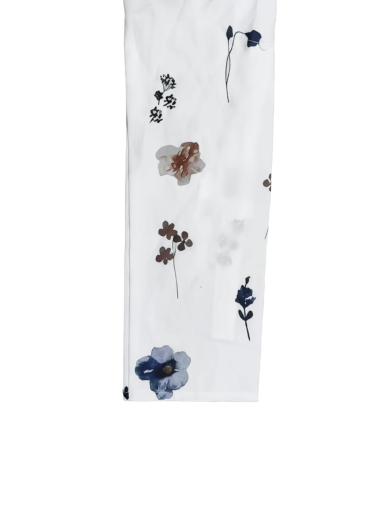 White fabric swatch with floral print in blue and brown tones