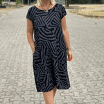 Dark navy zebra-print summer dress, round neckline and short sleeves, knee length