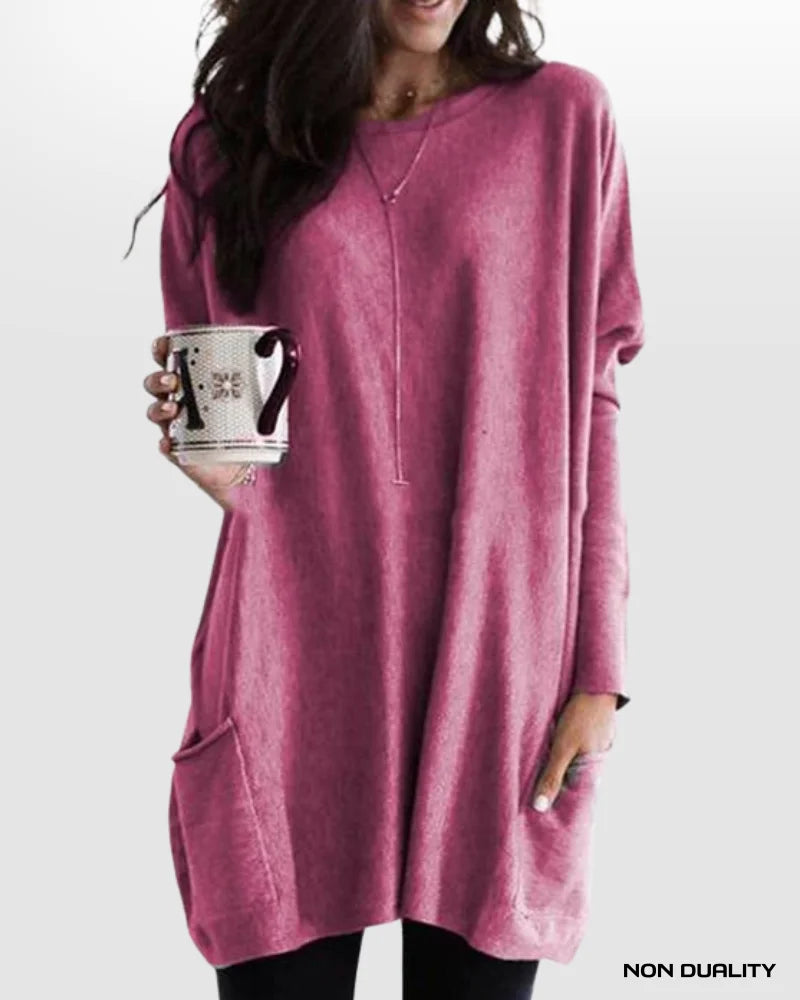 Loose tunic top in dark pink, long sleeves, round neckline, side pockets