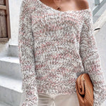 Loose knit pullover sweater with long sleeves, light heather gray speckled texture