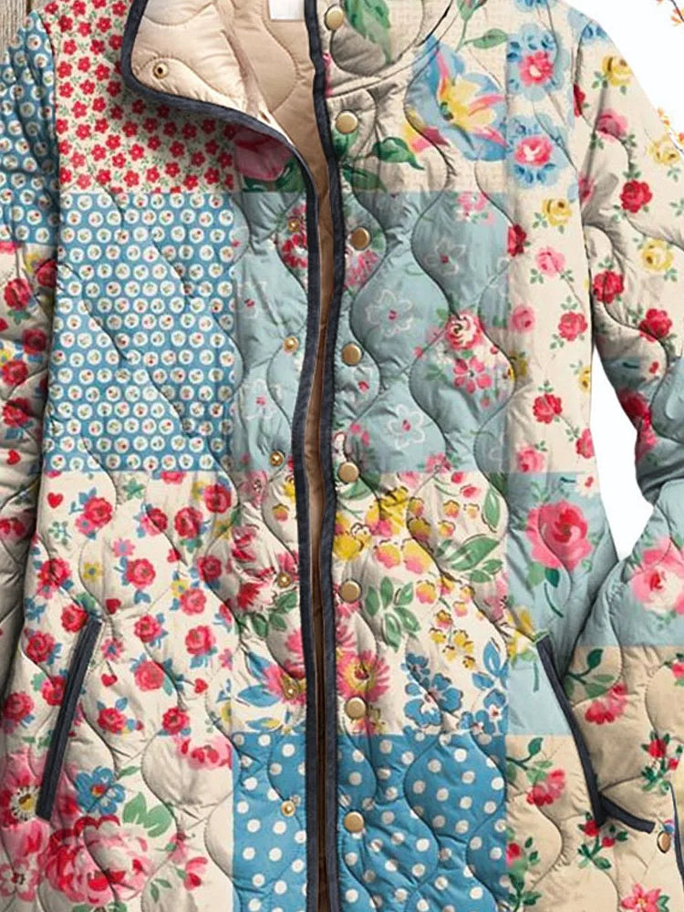 Women's floral quilted jacket front, patchwork print with button placket and dark trim