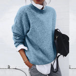 Soft crewneck pullover sweater in light blue, long sleeves.