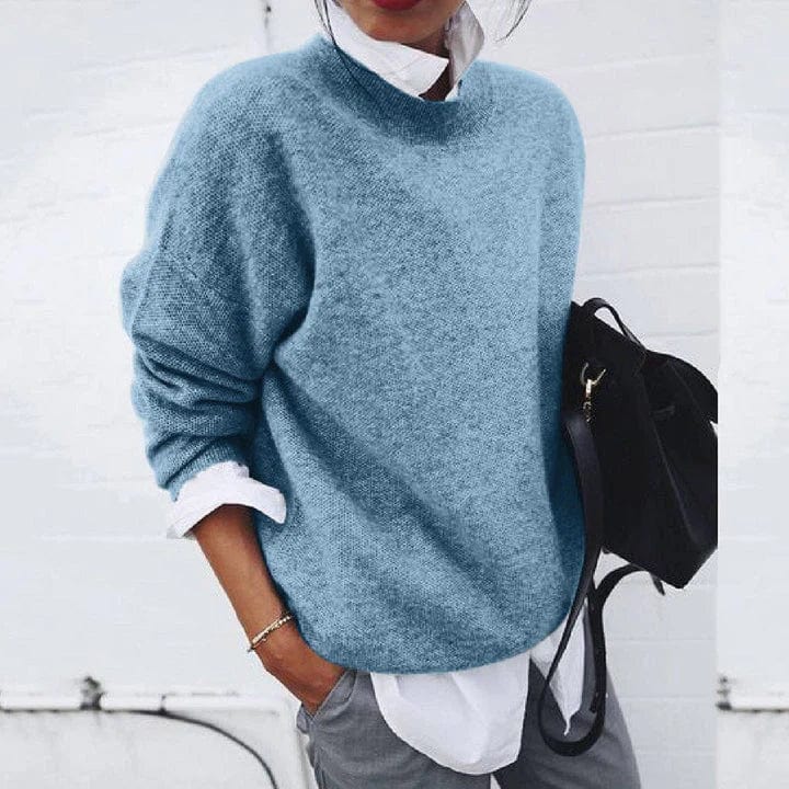 Soft crewneck pullover sweater in light blue, long sleeves.