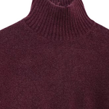 Burgundy ribbed knit turtleneck sweater detail, high neck