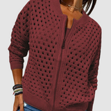 Burgundy knit cardigan with full-zip front and textured dotted pattern.