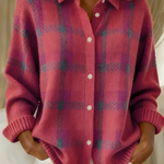 Pink plaid button-front cardigan sweater with collared neckline and long sleeves