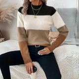 Color-block knit sweater with black shoulders, cream, tan and brown sleeves, crew neck