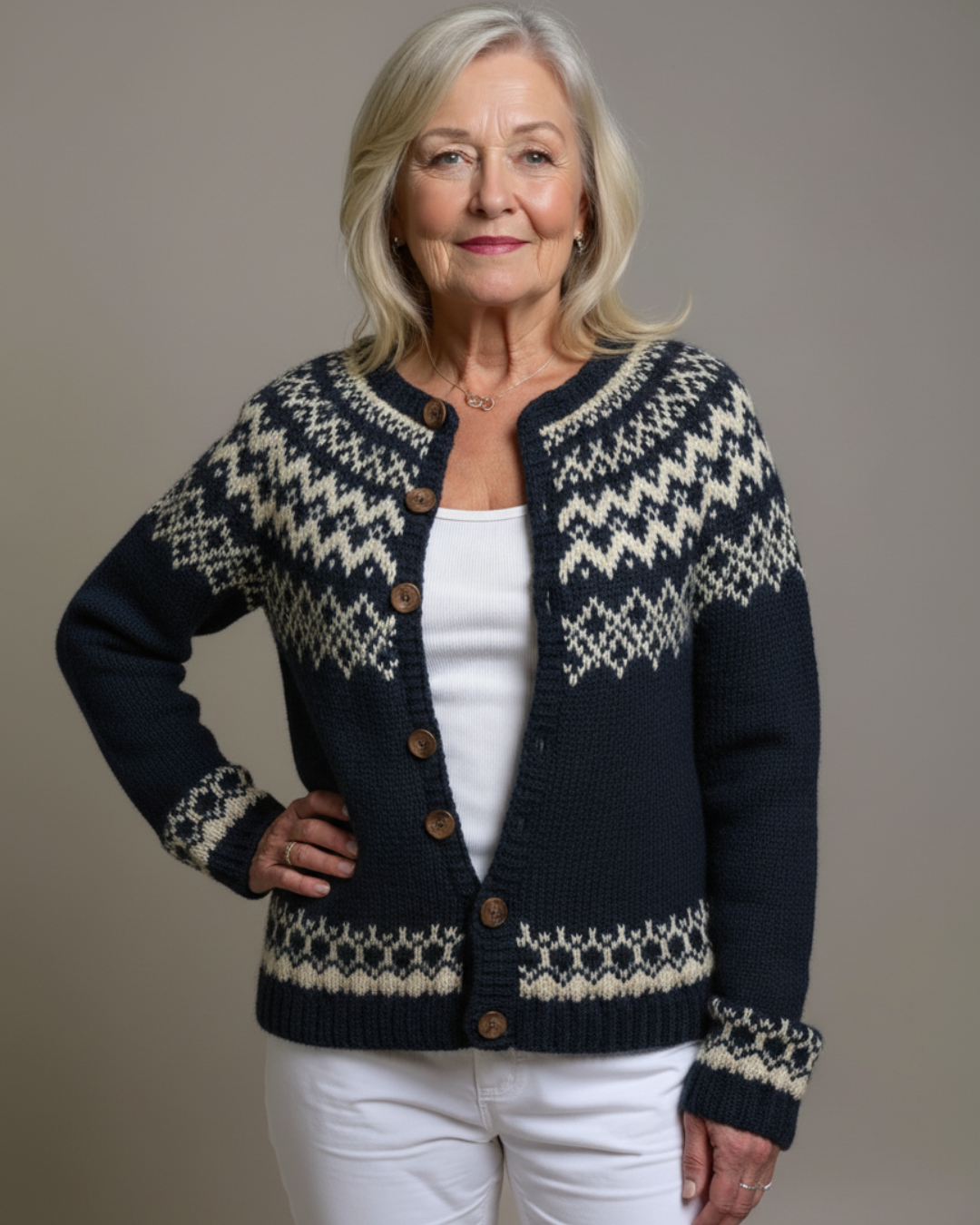 Hadley vintage knit cardigan in dark navy with cream Fair Isle pattern and wood-look buttons.