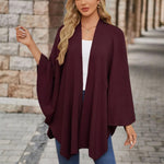 Wine red draped poncho with open front and loose V-neck, wide cape sleeves