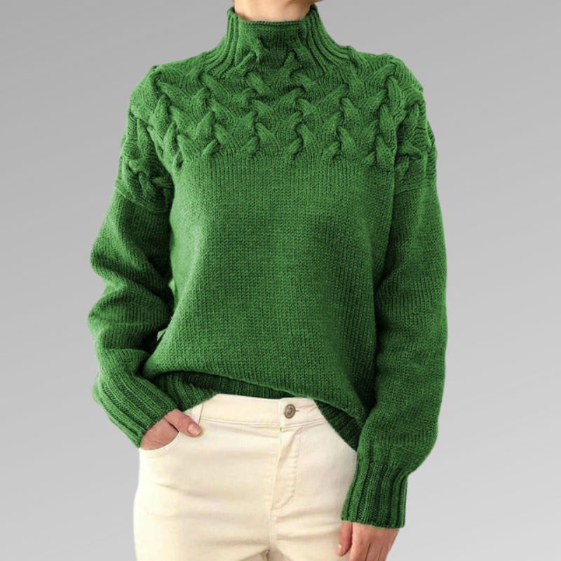 Women's cable-knit turtleneck sweater, green with raised cable front and cuffs.