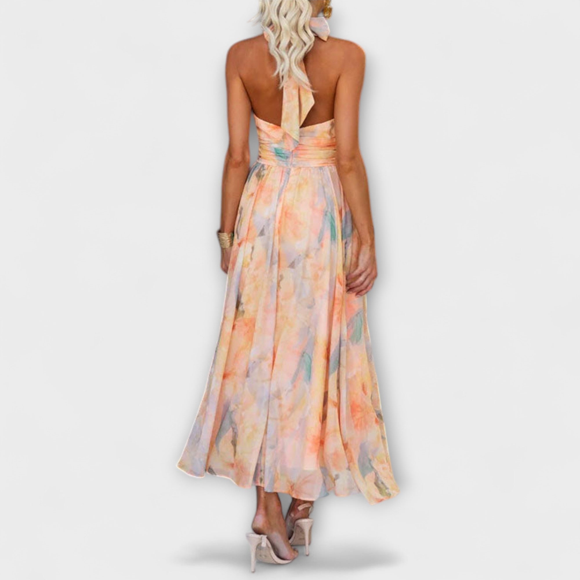 Backless halter maxi dress with pastel watercolor print and crisscross straps
