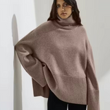 Brown knit turtleneck sweater with long sleeves and ribbed collar
