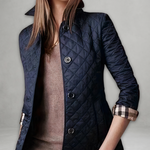 Navy quilted fall jacket with button front and stand collar, long sleeves