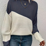 Navy blue and white color-block pullover sweater with long sleeves and crew neck