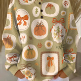 Light green knit sweater with colorful bow and pumpkin motifs, button-front round neck, long sleeves