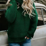 Green roll-neck knitted sweater with long sleeves and ribbed hem.