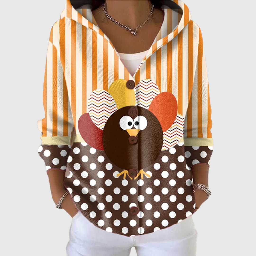 Hooded knit cardigan with button front, orange-and-white vertical stripes and brown polka-dot hem