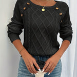 Black cable-knit crewneck sweater with decorative shoulder buttons and ribbed cuffs