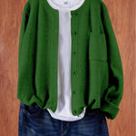 Green round-neck cardigan with button front and side pocket