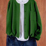 Green round-neck cardigan with button front and side pocket