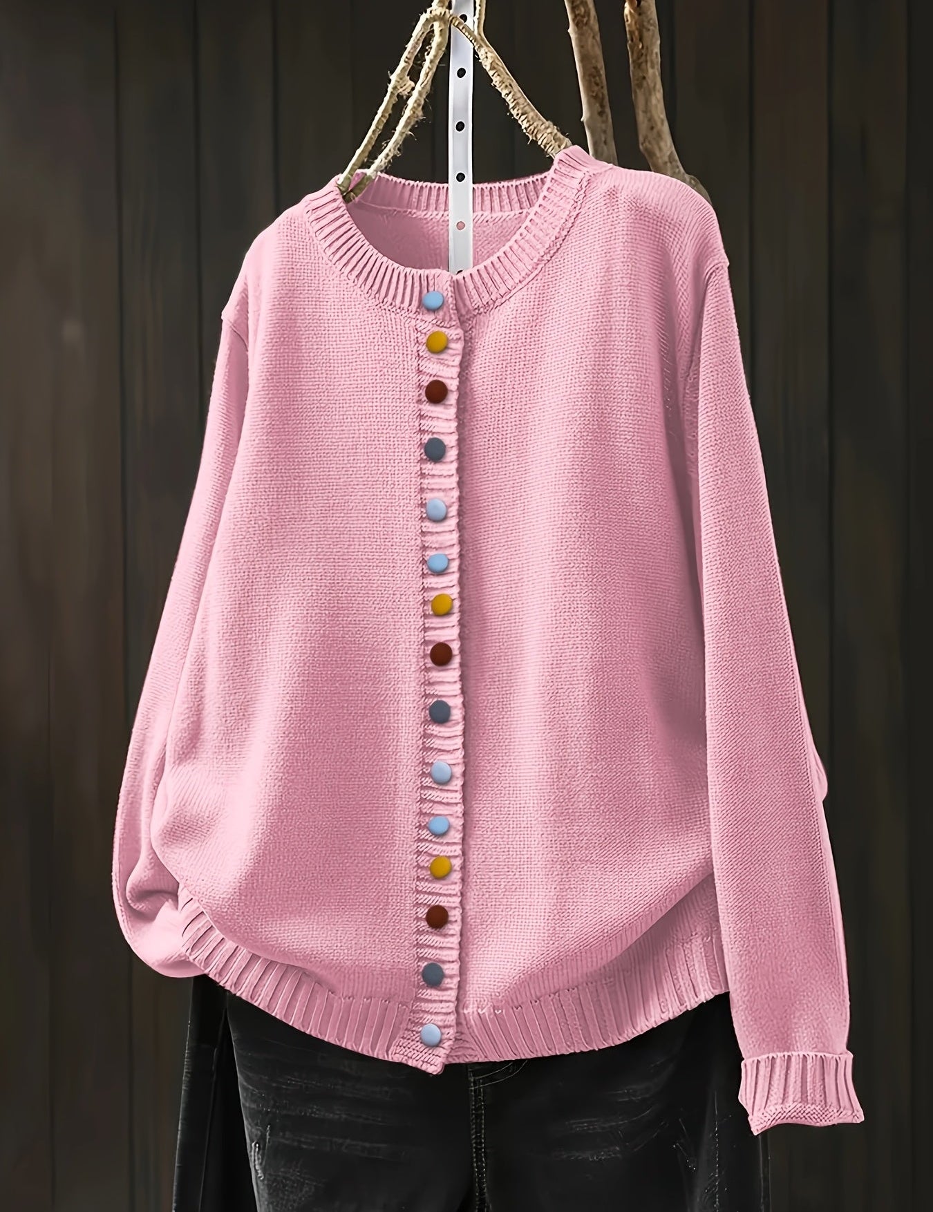 Pink cardigan sweater with button front and ribbed crew neckline