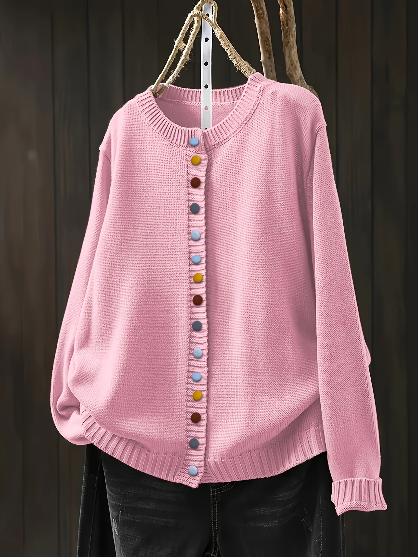 Pink cardigan sweater with button front and ribbed crew neckline
