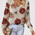 Relaxed floral pullover sweater, cream knit with red floral print, V-neck, long sleeves