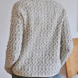 Womens knit pullover with crew neckline and allover speckled texture, long sleeves
